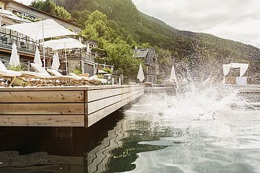 Jump into the lake from the private bathing jetty